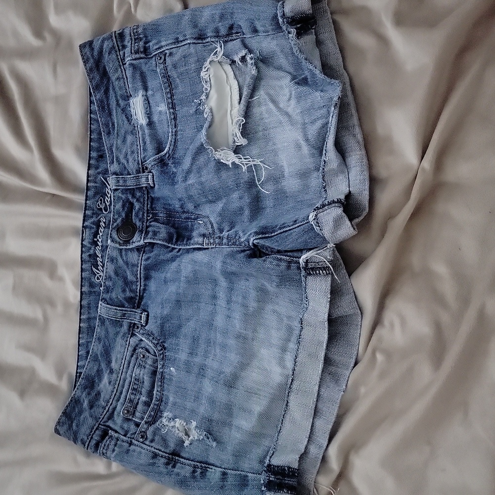 Distressed denim shorts